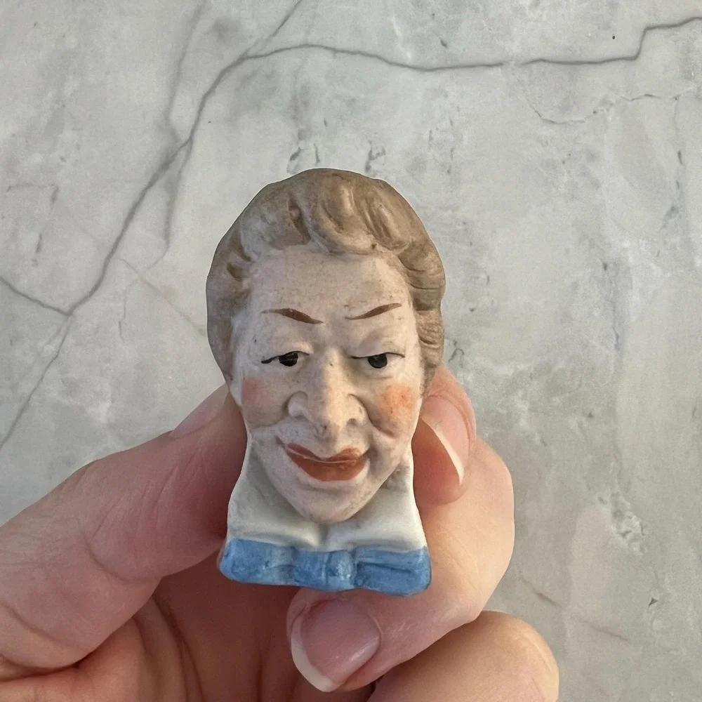 Pair of antique small figuring heads - perfect for candlestick or‎ salt